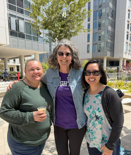 three advisors drinking coffee